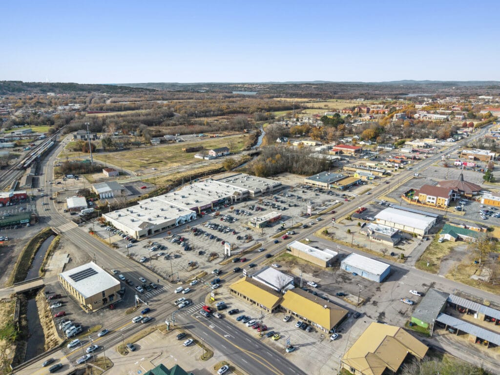 Exterior view of City Mall Retail Center in Russellville, AR, showcasing the building's signage and surrounding area.