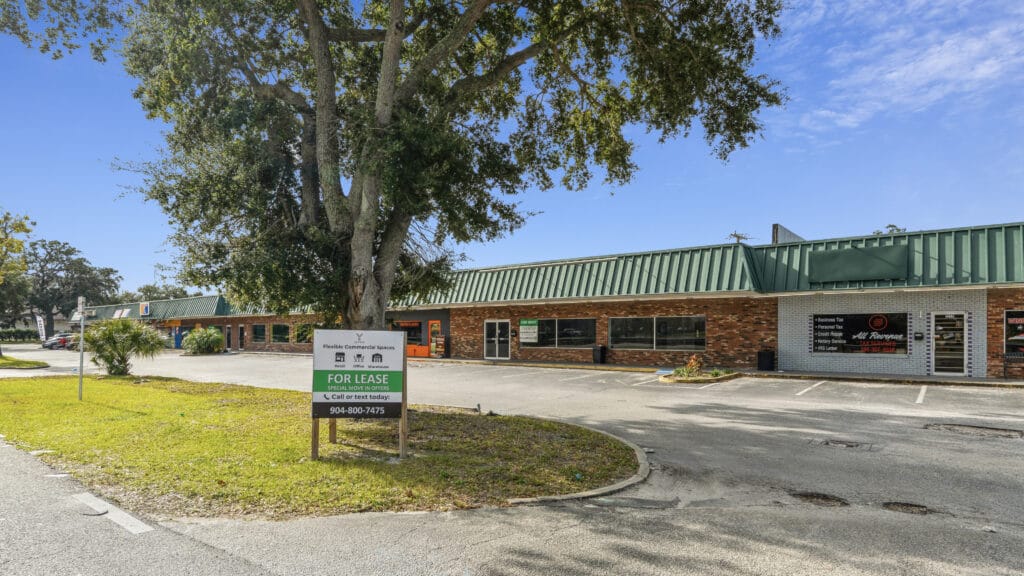 Exterior view of 1210 N Nova Rd, Daytona Beach, showcasing a commercial property with a modern design.