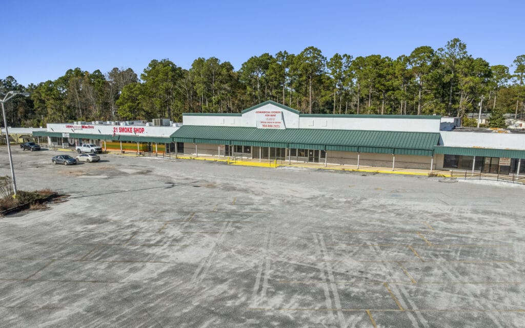 Exterior view of a commercial building at 2505 S Main St, Moultrie, GA, featuring a clear blue sky.