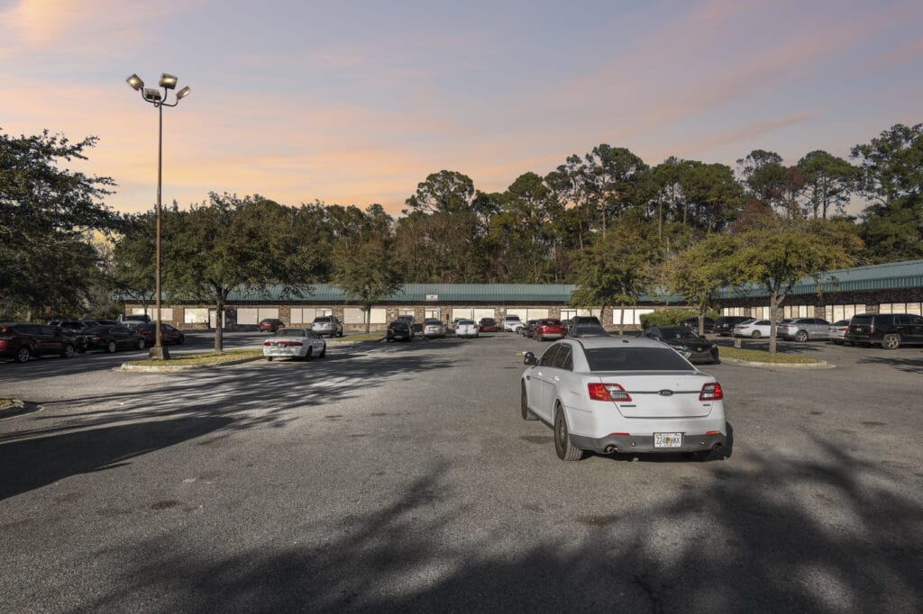 Exterior view of 2851 Edgewood Ave N in Jacksonville, showcasing the building's modern architecture and surrounding landscape