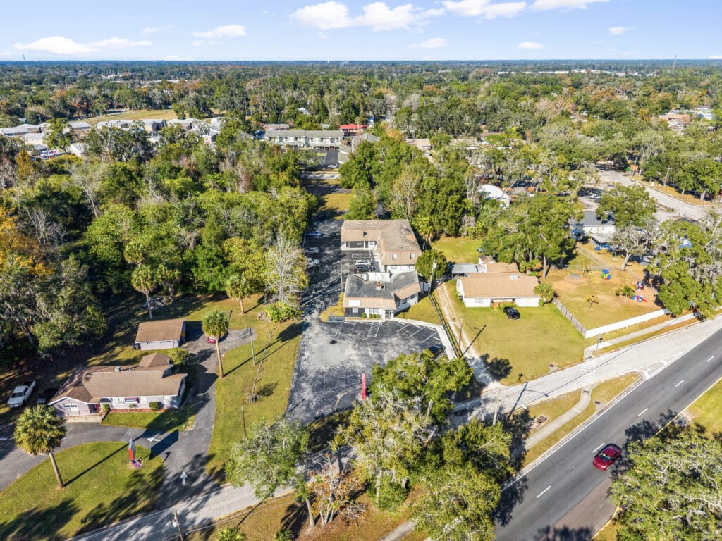 Exterior view of a residential property located at 2941 NE 3rd St, Ocala, FL, showcasing its architecture and landscaping.