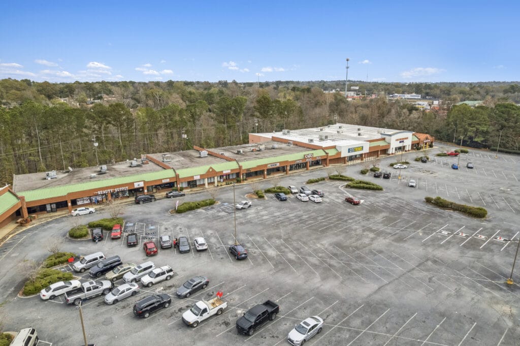 Exterior view of the property at 3555 Mercer University Dr, featuring a modern design and landscaped surroundings.