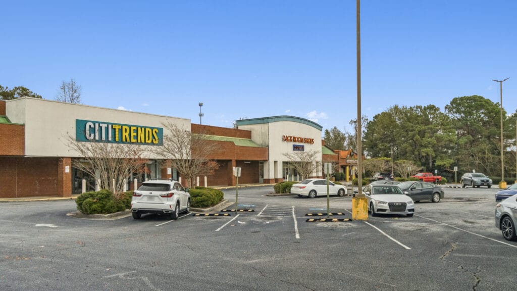 Exterior view of a modern building at 3555 Mercer University Dr, showcasing its architecture and surrounding landscape.