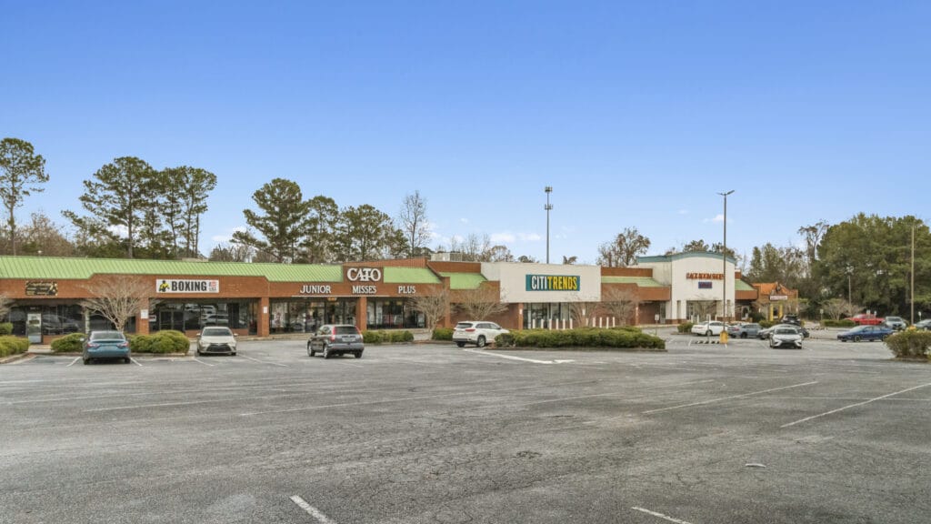 Exterior view of the property at 3555 Mercer University Dr, showcasing the building's architecture and surrounding landscape.