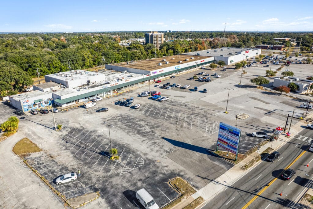 Exterior view of Norwood Plaza Flea Market in Jacksonville, showcasing its entrance and surrounding area.