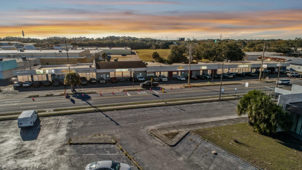 Exterior view of the Norwood Strip Mall located at 5848 Norwood Ave, Jacksonville, FL, showcasing the building's architecture