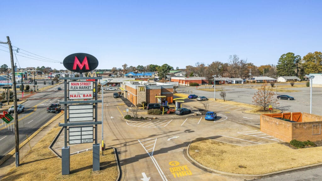 Exterior view of a commercial property at 638 W Main St, Jacksonville, AR, showcasing its architecture and surroundings.