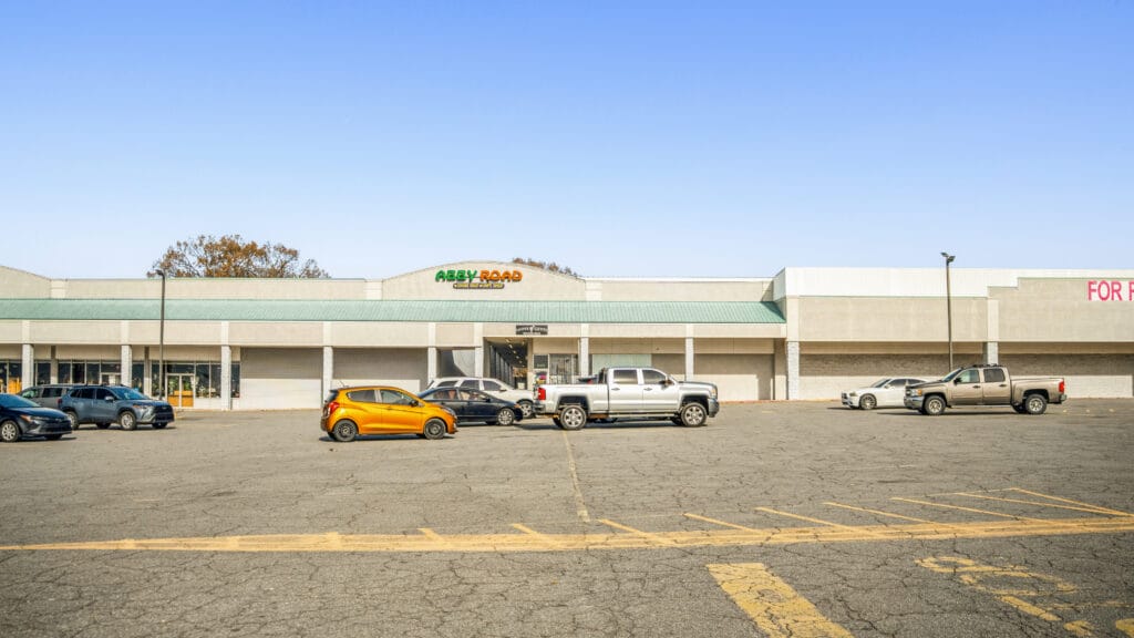 Exterior view of 638 W Main St in Jacksonville, AR, showcasing the building's architecture and surrounding landscape.