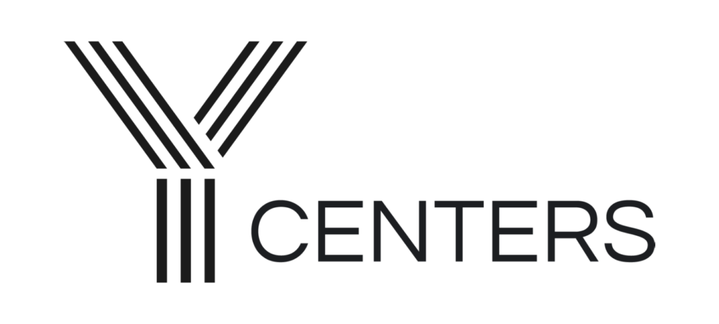 A sleek white logo featuring the text 'Y Centers' on a transparent background, emphasizing modern design.