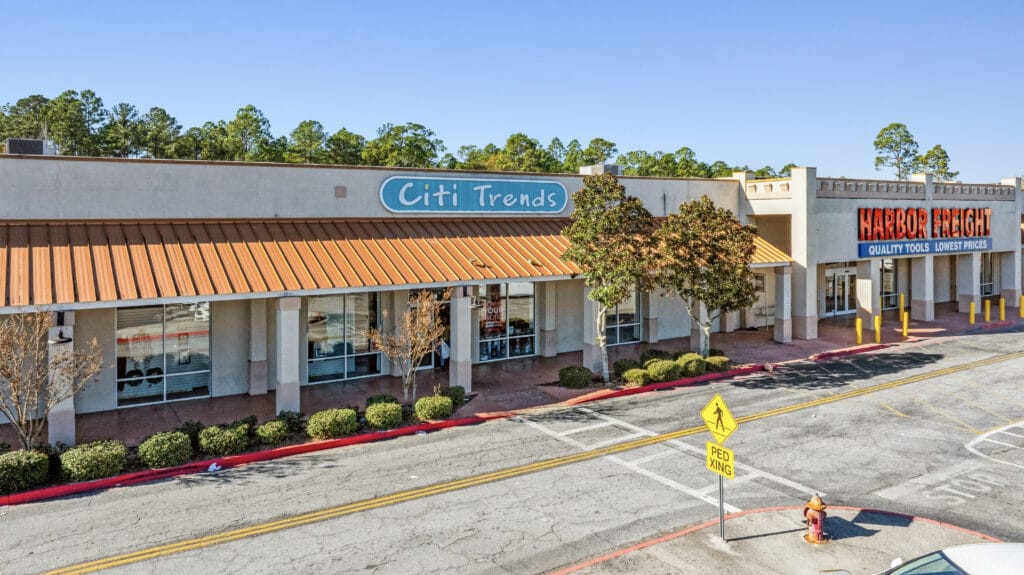 Exterior view of 229 W General Screven Way in Hinesville, GA, showcasing the building and surrounding landscape.
