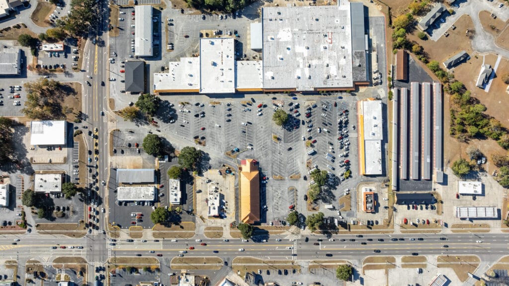 Exterior view of a commercial property at 229 W General Screven Way, Hinesville, GA with a clear blue sky.