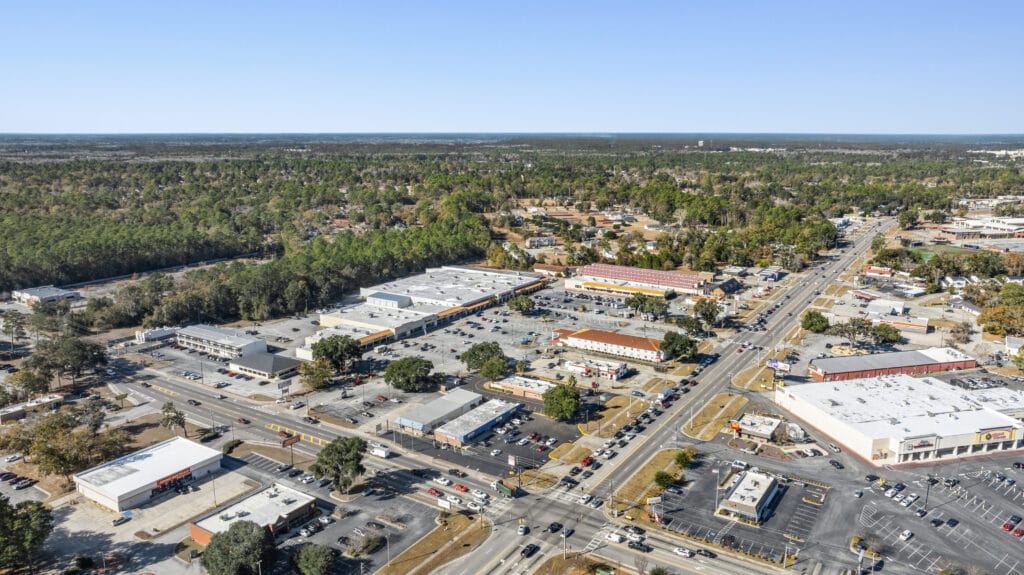Exterior view of a large commercial building located at 229 W General Screven Way, Hinesville, GA, showcasing its architectur