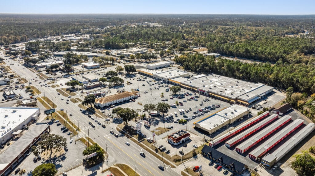 Exterior view of a commercial property at 229 W General Screven Way, Hinesville, GA, showcasing its entrance and surrounding