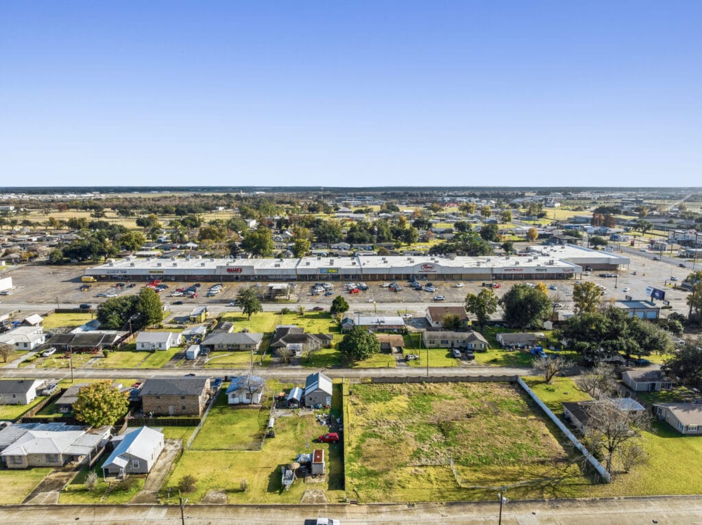 Exterior view of a commercial property at 1221 Grand Caillou Rd, Houma, LA, showcasing its architecture and surroundings.