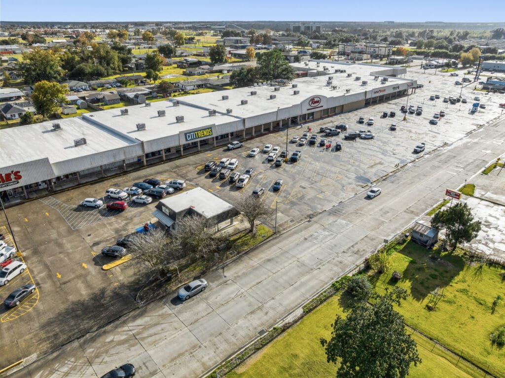 Exterior view of a commercial property at 1221 Grand Caillou Rd, Houma, LA, showcasing its architecture and surroundings.