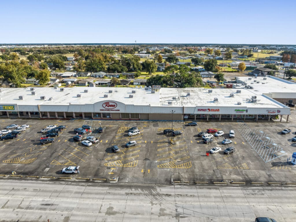Exterior view of a commercial property at 1221 Grand Caillou Rd, Houma, LA, showcasing its architecture and surroundings.