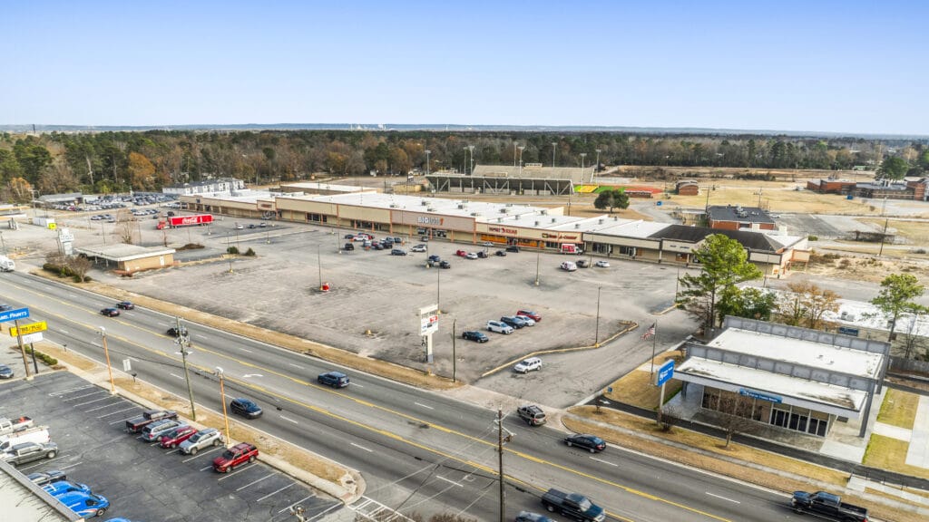 Two commercial buildings located at 2704 and 2708 Peach Orchard Rd, Augusta, GA, showcasing a brick facade and parking area.