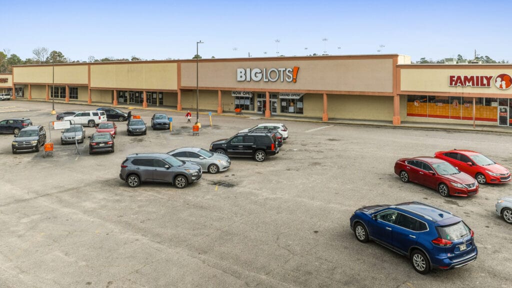 Two commercial buildings at 2704 and 2708 Peach Orchard Rd, Augusta, GA, showcasing a modern facade and ample parking.