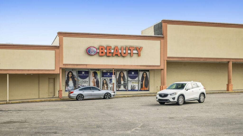 Two commercial buildings at 2704 and 2708 Peach Orchard Rd, Augusta, GA, showcasing their exterior design and surroundings.