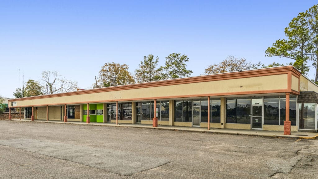 Two commercial buildings located at 2704 and 2708 Peach Orchard Rd, Augusta, GA, showcasing their architecture and signage.