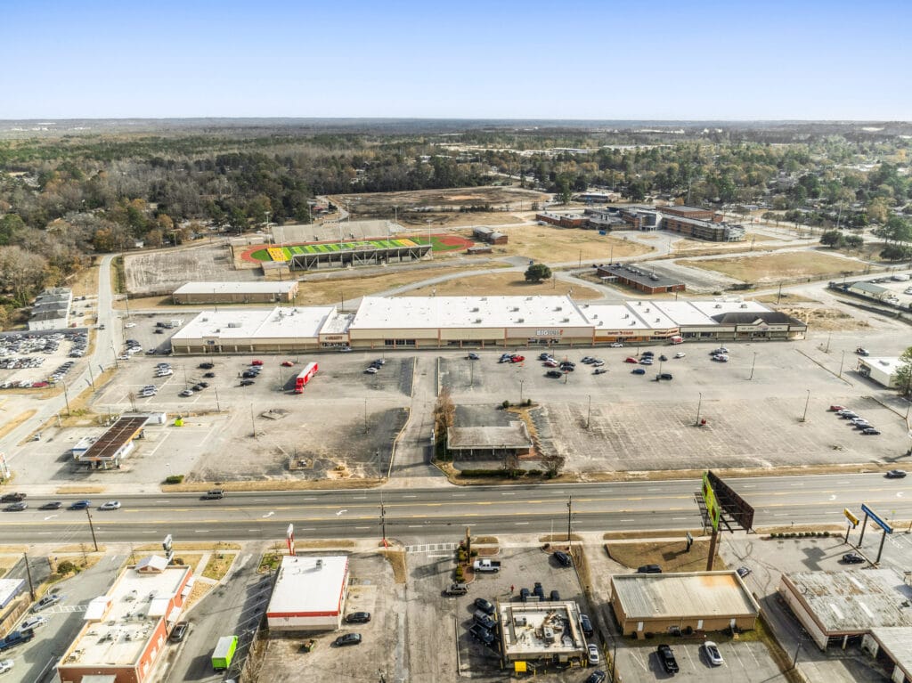 Exterior view of 2704 and 2708 Peach Orchard Rd, showcasing the building's architecture and surrounding landscape.