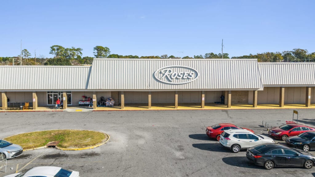 Exterior view of Moultrie Plaza, showcasing the building's architecture and surrounding landscape in Moultrie, GA.