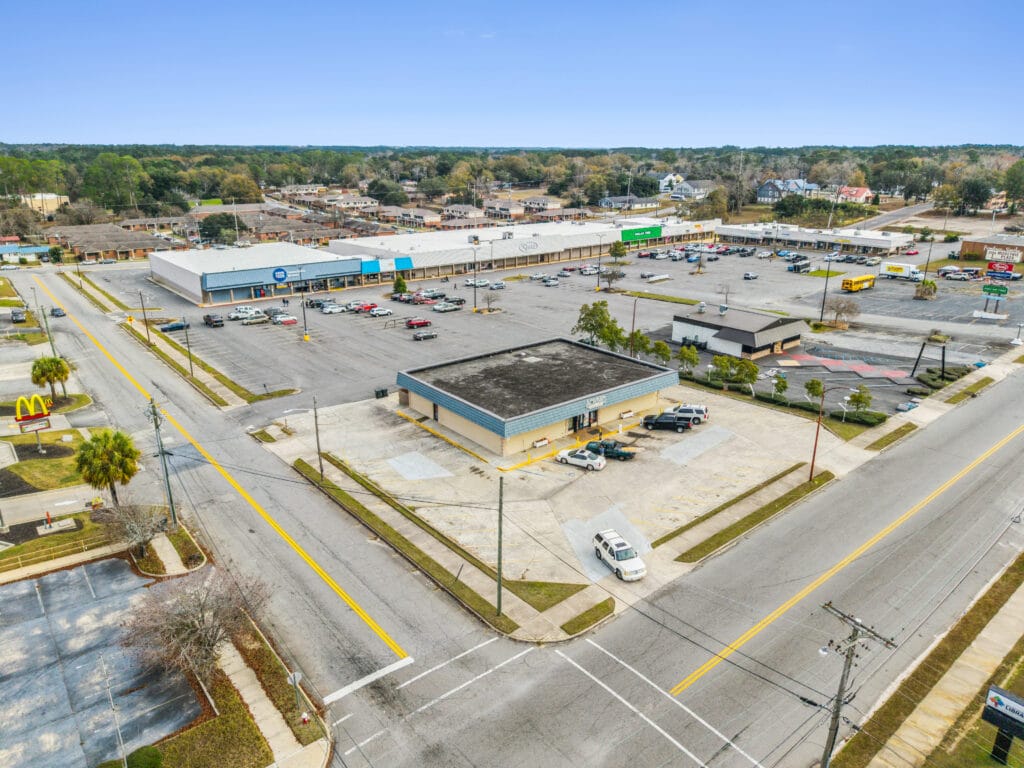 Exterior view of Moultrie Plaza, showcasing the building's architecture and surrounding area in Moultrie, GA.