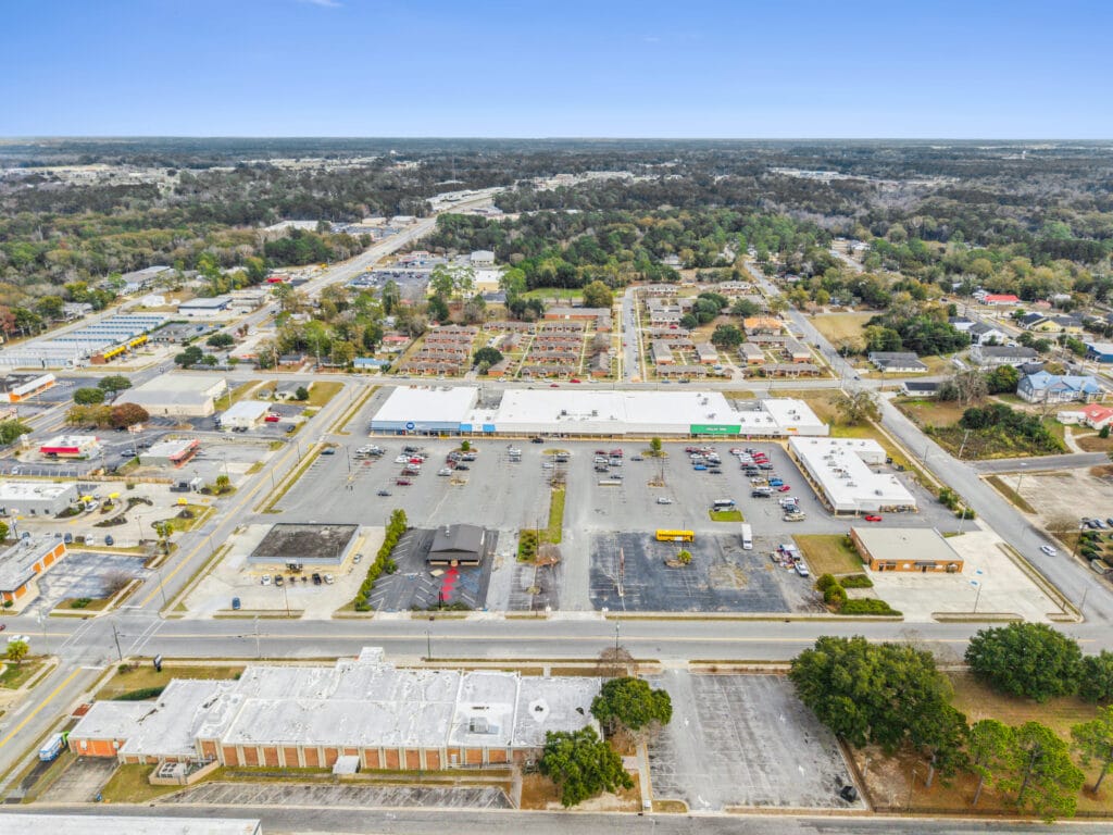 Exterior view of Moultrie Plaza, showcasing the building's architecture and surrounding landscape in Moultrie, GA.