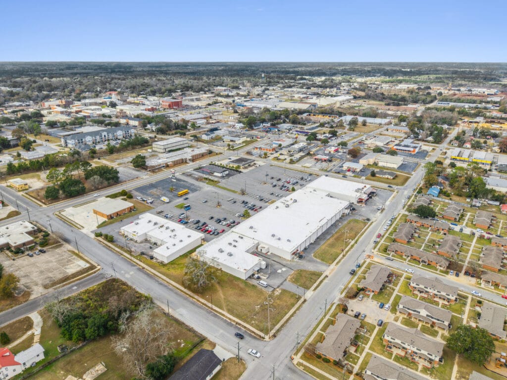 Exterior view of Moultrie Plaza, showcasing the building's architecture and surrounding landscape.